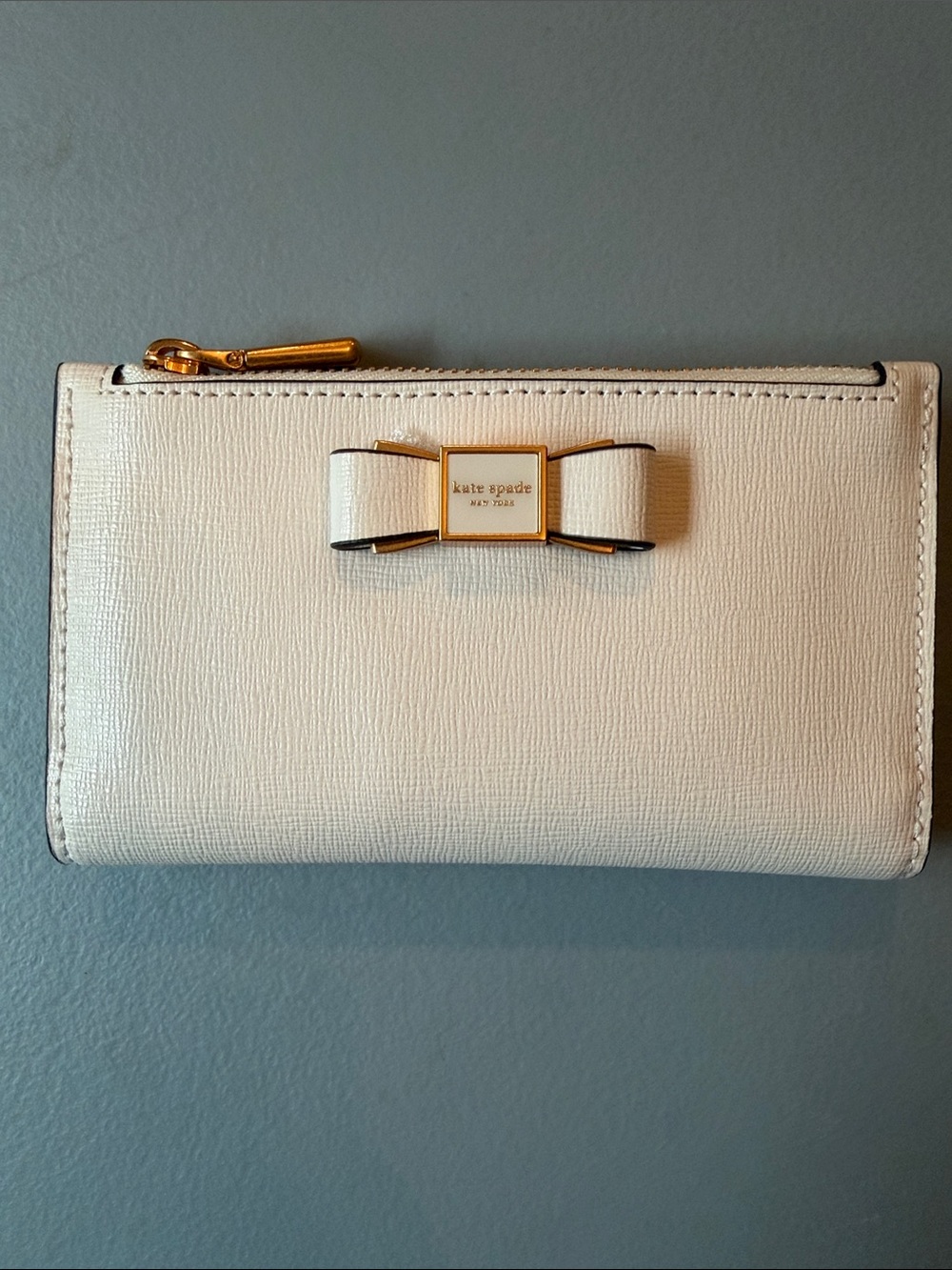 kate spade Cream Leather Bow Zip Wallet with Gold Hardware